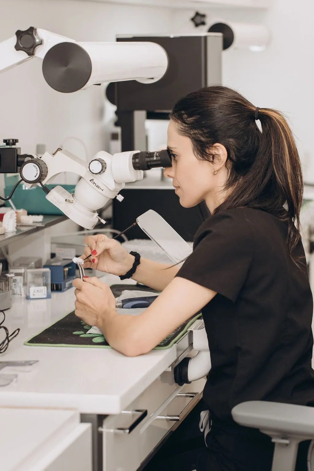 Dr. Rezaei working in the dental lab